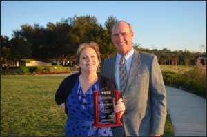 February 2018 - Bob presenting Outstanding Educator award to Hannah Robinson.